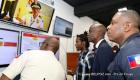Haiti's Police chief Michel Ange Gedeon showing President Jovenel Moise around Police Headquarters